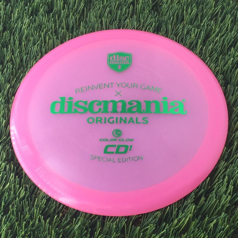 Discmania C-Line Color Glow Reinvented CD1 with Discmania Originals x Reinvent Your Game Special Edition Stamp – 174g – Translucent Pink
