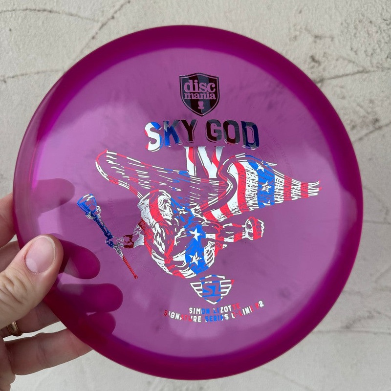Auction! Jan ’24 – Discmania Italian C-Line P2 New Original with Sky God IV – Simon Lizotte Signature Series Stamp – 174g – Translucent Purple