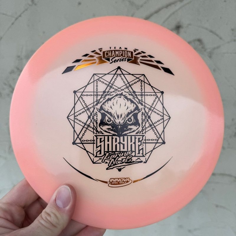 Auction! Jan ’24 – Innova Champion Glow Color Champion Shryke with Karina Nowels 2019 Tour Series Stamp – 175g – Translucent Orange