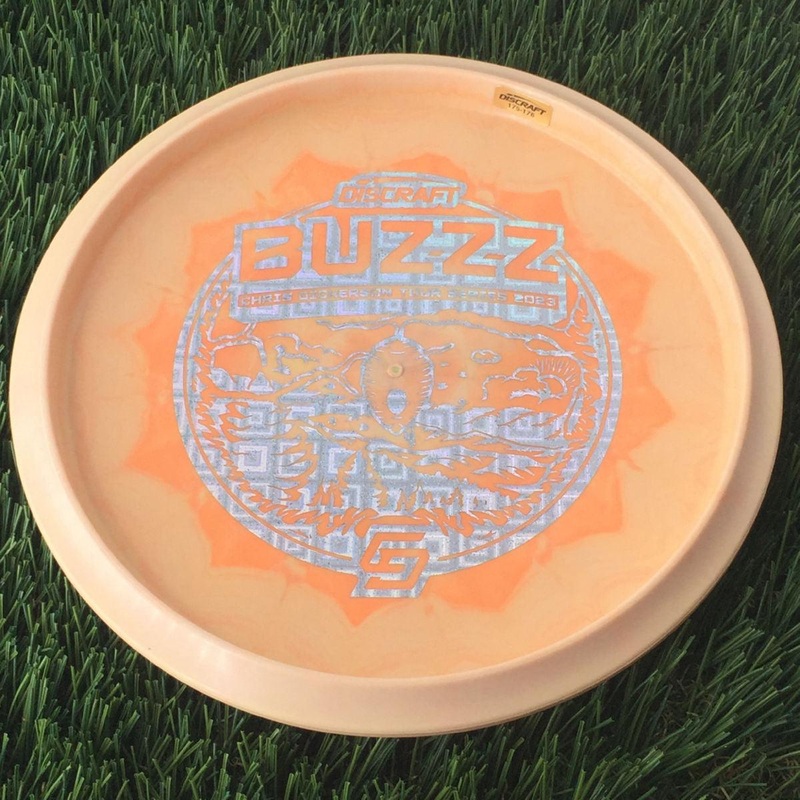 Discraft ESP Swirl Buzzz with Chris Dickerson Tour Series 2023 Stamp – 176g Light Orange
