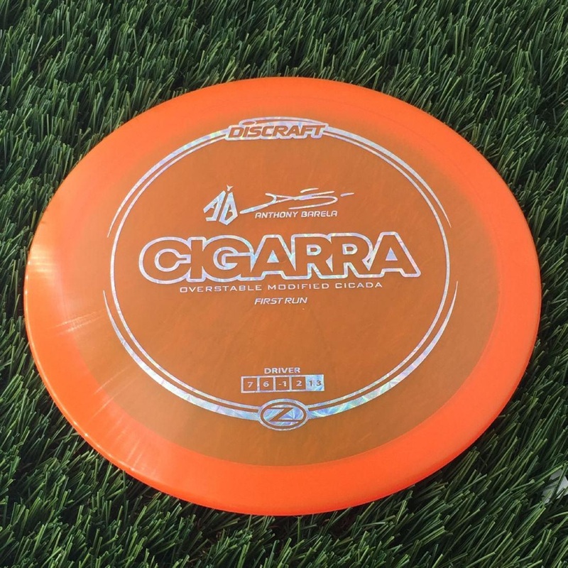 Discraft Elite Z Cigarra with First Run – Anthony Barela “AB” Signature – Overstable Modified Cicada Stamp – 174g – Orange