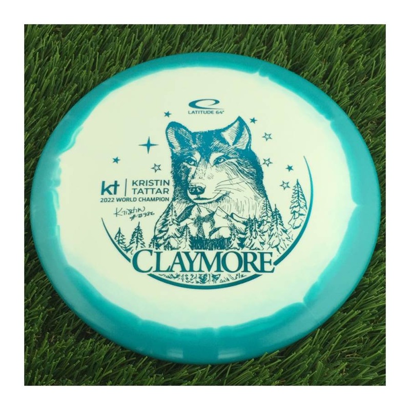 Latitude 64 Gold Line Orbit Claymore with Kristin Tattar #73986 – 2022 World Champion Team Series 2023 Stamp – 177g – Solid Teal Blue
