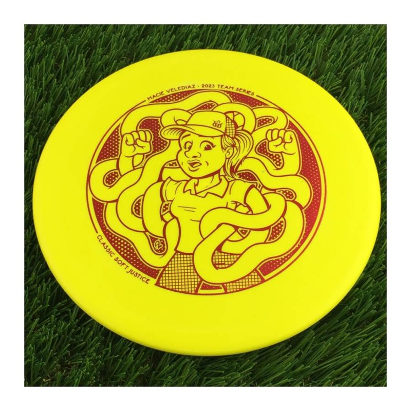 Dynamic Discs Classic Soft Justice with Macie Velediaz 2023 Team Series Stamp – 175g – Solid Yellow