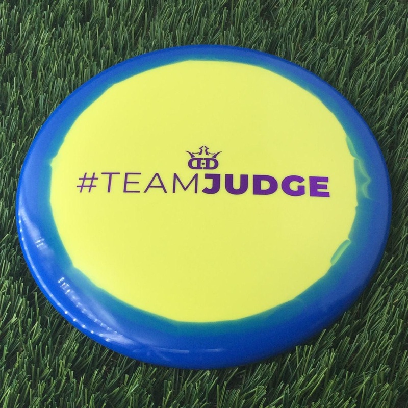Dynamic Discs Fuzion Orbit Judge with #TEAMJUDGE Stamp – 174g Bluish Yellow