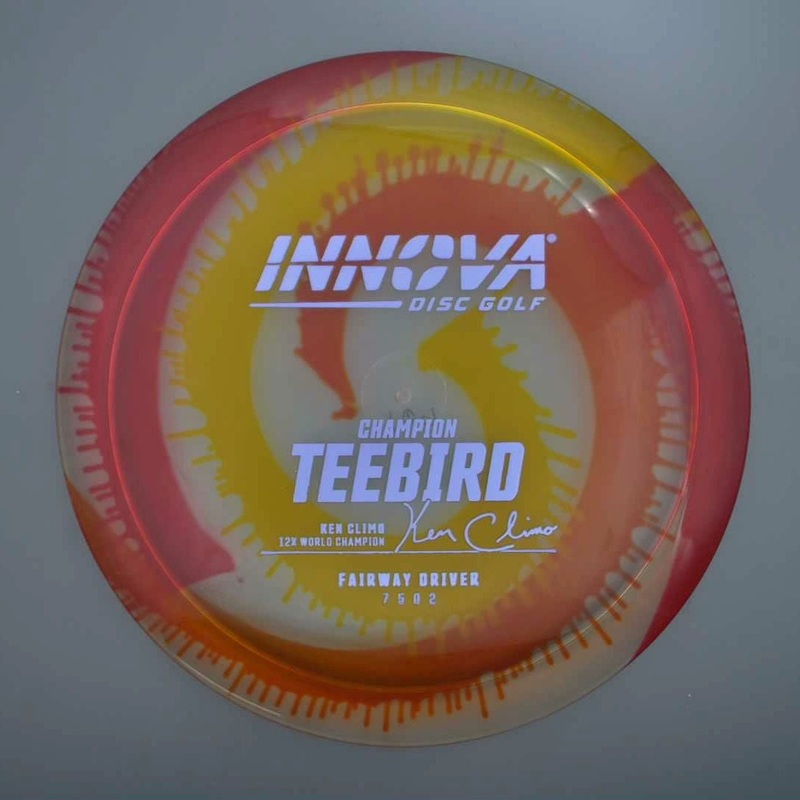 Innova Champion I-Dye Teebird with Ken Climo 12x World Champion Burst Logo Stamp – 168.9g – Dyed