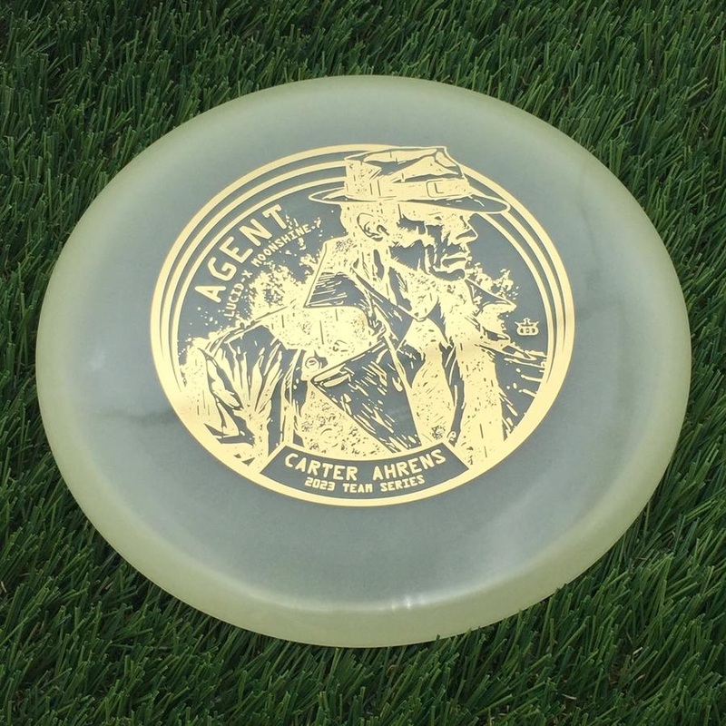 Dynamic Discs Lucid-X Moonshine Glow Agent with Carter Ahrens Secret Agent Team Series 2023 Stamp – 176g – Translucent Glow