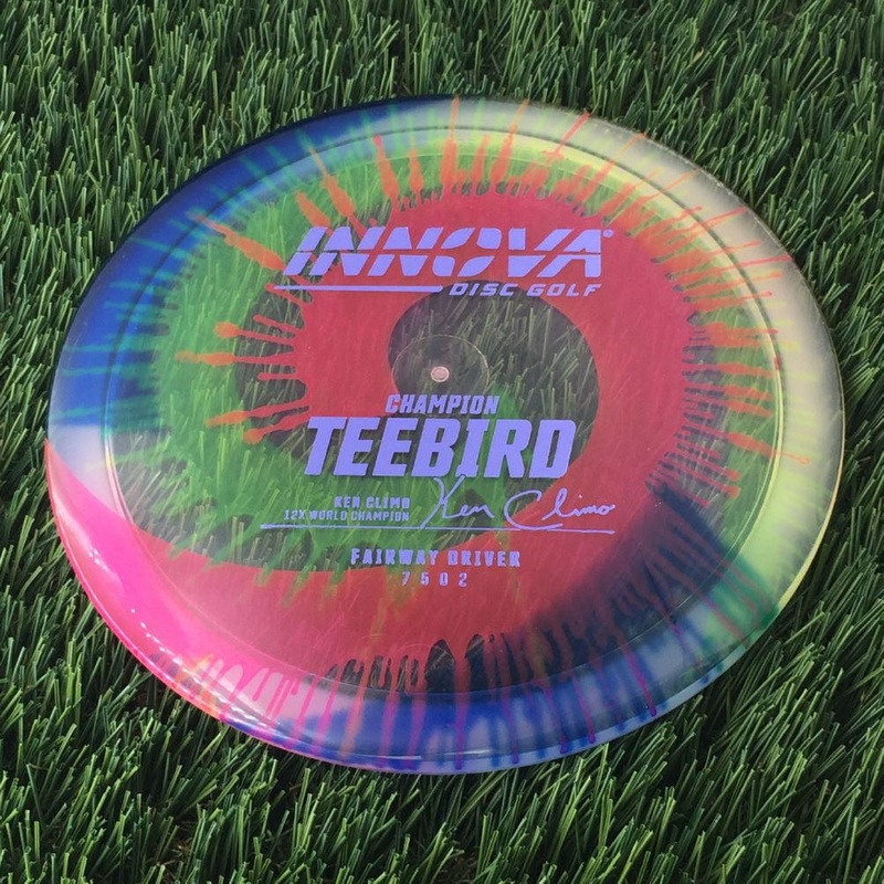 Innova Champion I-Dye Teebird with Ken Climo 12x World Champion Burst Logo Stamp – 171g – Translucent Dyed